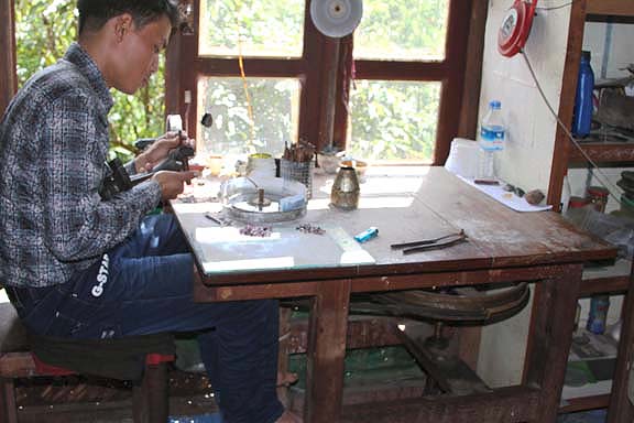 gem cutter working on rough gems