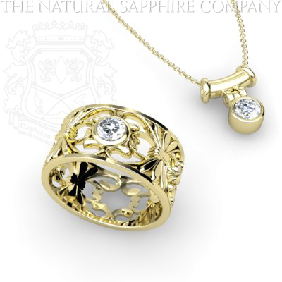 white sapphire ring and pendant in yellow gold
