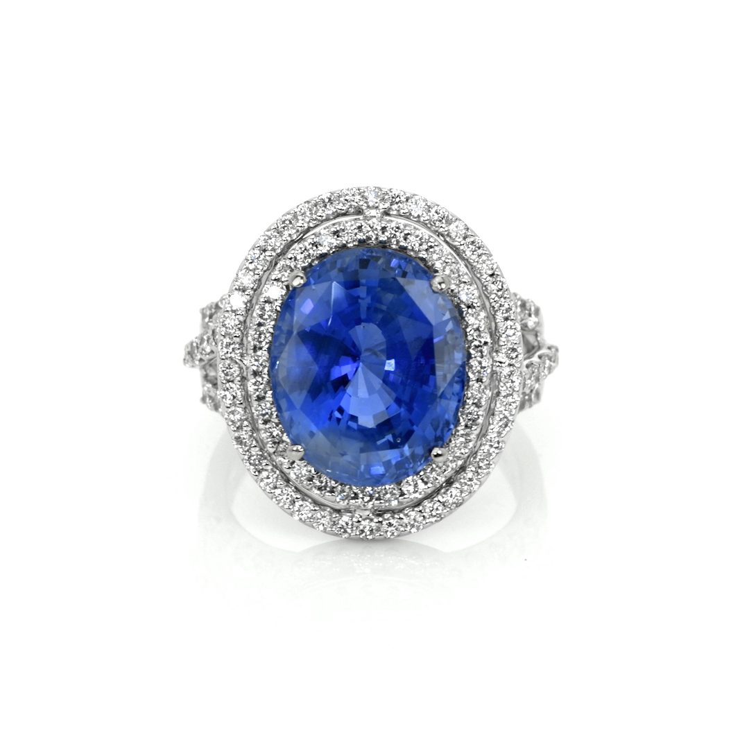 Royal sapphire engagement ring style: 9.01-carat oval Ceylon sapphire halo ring in 18K white gold, item J9755
