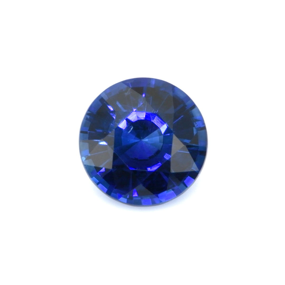 Natural 1.56 carat Ceylon blue round sapphire on a white background