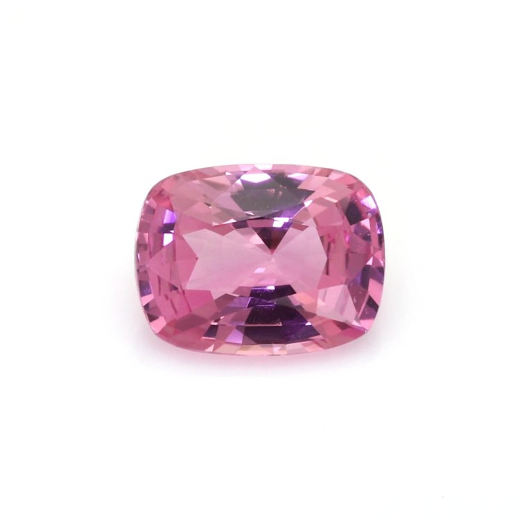 Natural 1.33 carat Ceylon pink cushion sapphire on a white background
