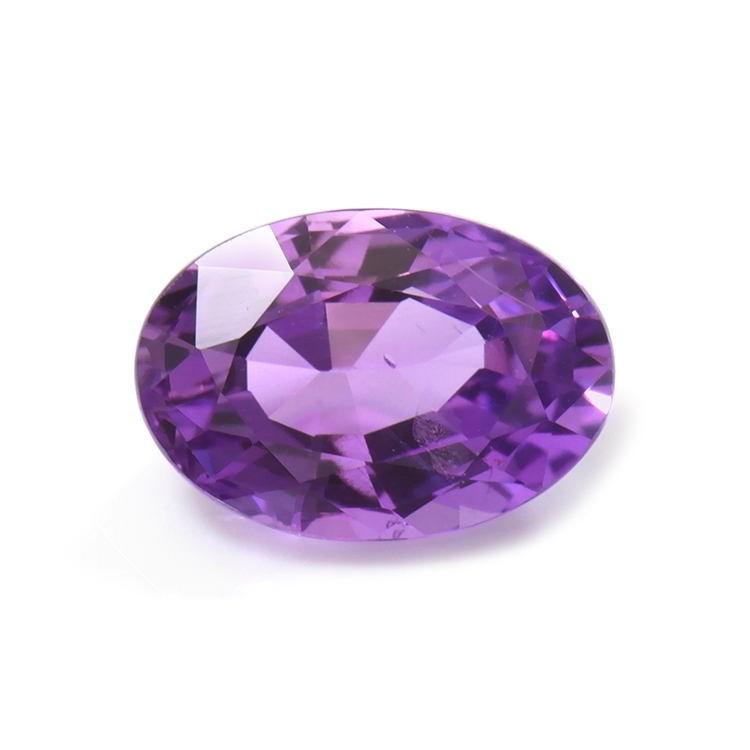 Natural 1.34 carat Ceylon purple oval sapphire on a white background